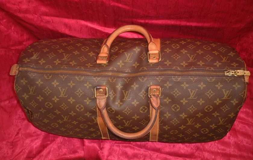 Louis Vuitton Keepall 55 duffle bag for travel unisex  