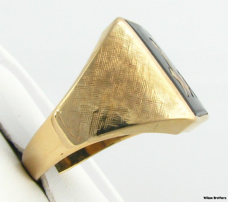 This ring weighs 6.7 grams . The face measures 11/16 (17.4mm) tall 