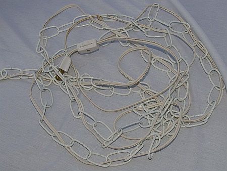 has 12 foot long white swag chain cord with built