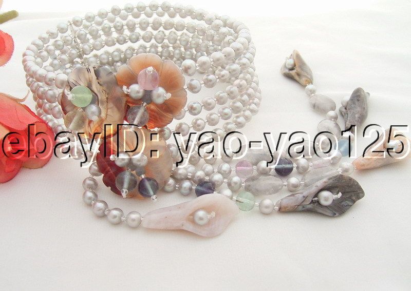   oval cloudy quartz, agate and stone flower, good quality, high luster