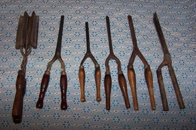 ANTIQUE SIX CURLING IRONS METAL ROD WOODEN HANDLES  